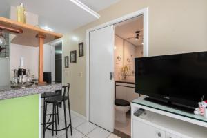 Studio com vista para o mar no centro de Guarapari com Wifi