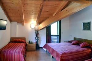 Chambre Triple – Vue sur Montagne