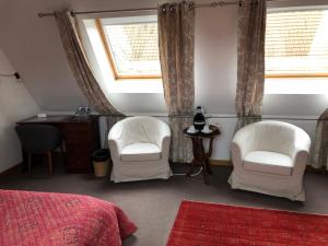 B&B / Chambres d'hotes La Ferme de la Place : photos des chambres