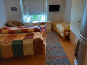 Triple Room with Shared Bathroom room in Opintola Bed & Breakfast
