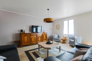 Maisons de vacances Charmante maison pour 10 personnes : photos des chambres