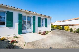 Maisons de vacances Charmante maison pour 10 personnes : photos des chambres