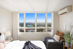 Relax with Beach & River views in 3br apt w pool