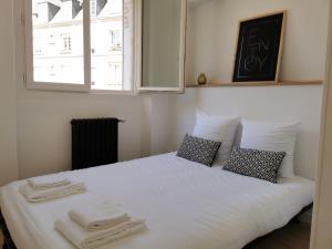 Appartements L'EMILIO - hypercentre, lumineux et vue Loire : photos des chambres