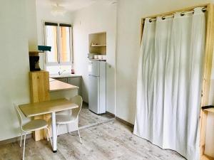 Appartements Studio Amelie - Les- Bains : photos des chambres