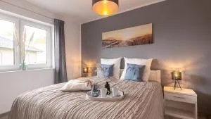 Ferienhaus Sonneneck am Harkebrügger See mit Sauna - Barßel