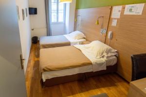 Hotels Hotel Edmond Rostand : photos des chambres