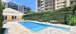 Casa com piscina a metros da praia em Riviera