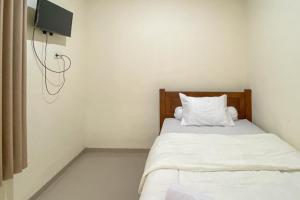 Nipa Guest House near Universitas Widyagama Mitra RedDoorz