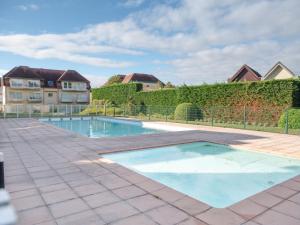 Studio Zeeflat with parking and shared pool by Interhome