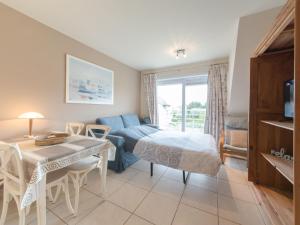 Studio Zeeflat with parking and shared pool by Interhome