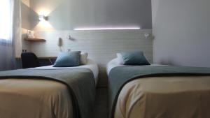 Hotels Kyriad Montpellier Sud - A709 : photos des chambres
