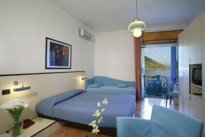 Camera Tripla Comfort con Vista Mare