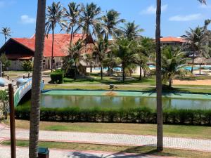 Apartamento no Aquaville Resort, do lado da sombra e perto da praia