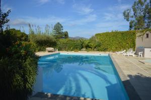 Maisons de vacances Villa Oletta, avec piscine et tennis communs, a 5km de St Florent : photos des chambres