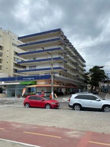 Loft Vista Mar 211 - Praia do Morro - prédio frente Mar - varanda com vista mar - elevador - atravessou a avenida, ja esta na Praia - internet - com garagem para carro pequeno