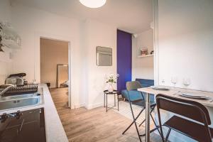 Appartements La Suite - Paisible et a deux pas de la gare : photos des chambres