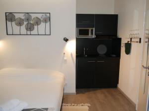 Appartements Studio cosy black : photos des chambres