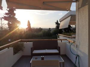 Breezy summer maisonette with exciting view!