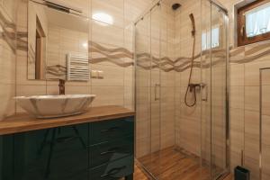 Apartamenty Grand Tatry - sauna i jacuzzi wliczone w cenę pobytu - 10 minut pieszo od Term Bania - znajdują się one w budynku obok