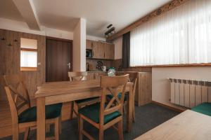 Apartamenty Grand Tatry - sauna i jacuzzi wliczone w cenę pobytu - 10 minut pieszo od Term Bania - znajdują się one w budynku obok