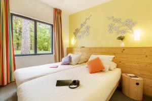 Villages vacances Center Parcs Les Hauts de Bruyeres : photos des chambres