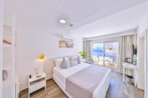 Double or Twin Room with Side Sea View room in La Kumsal Hotel