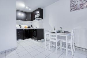 Appartements Joyau, serenite, proche Disney et Paris : photos des chambres