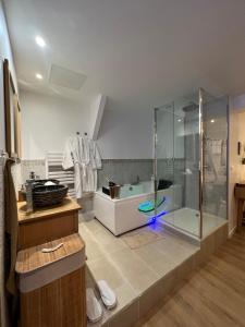 Appartements PARENTHESE LOVE - Bali Mon Amour Suite Balneo SPA Proche Orly-Paris : photos des chambres