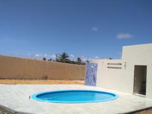 Casa de praia condomínio fechado, frente para o mar