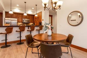 Modern Riverstone Condo with Grand Deck - Steps to Shops, Restaurants, Trails and River