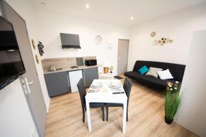 Appartements MAHORA - CHARMANT Studio HOME STAGING AU CENTRE-VILLE : photos des chambres