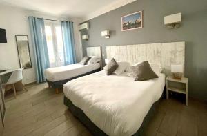 Hotels Hotel Les Palmiers En Camargue : photos des chambres