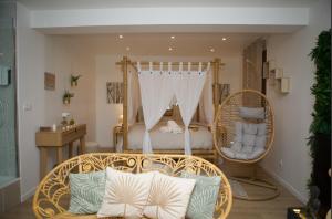 Appartements PARENTHESE LOVE - Bali Mon Amour Suite Balneo SPA Proche Orly-Paris : photos des chambres