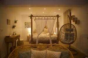 Appartements PARENTHESE LOVE - Bali Mon Amour Suite Balneo SPA Proche Orly-Paris : photos des chambres