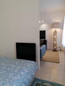 Appartements GRISOLLES - Confortable T2, coeur de village, 5min Canal du Midi & Gare : photos des chambres