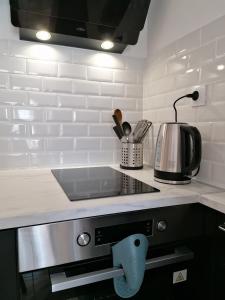 Appartements GRISOLLES - Confortable T2, coeur de village, 5min Canal du Midi & Gare : photos des chambres