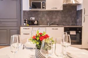 Appartements Nouveau - L'Intemporel - Centre Ville : photos des chambres