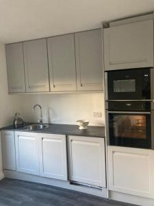 Entire Terraced two story redbrick house with parking in secluded cul de sac