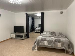 Appartements Appartement dans maison a Corbelin proche Walibi : photos des chambres