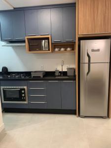 Apartamento 2 quartos home club na praia de palmas