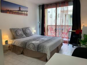 Appartements Nimes studio parking Dhuoda : photos des chambres