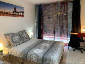 Appartements Nimes studio parking Dhuoda : photos des chambres