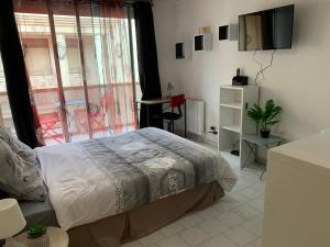 Appartements Nimes studio parking Dhuoda : photos des chambres