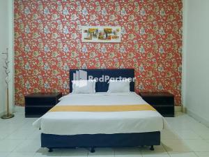 Hotel Puri Yasmin Potowanua Lasusua Mitra RedDoorz