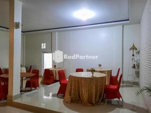 Hotel Puri Yasmin Potowanua Lasusua Mitra RedDoorz