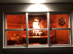 Modern Lapland Cottage with Outdoor Sauna & BBQ Hut