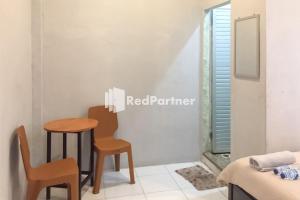 Aquino Marito Homestay Mitra RedDoorz