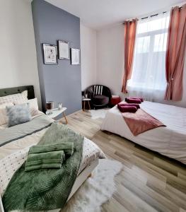 Appartements Le HomeDesign - Logement privatif 70m2 Cambrai centre : photos des chambres