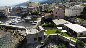 Maisons de vacances Maison de 3 chambres a Erbalunga a 10 m de la plage avec vue sur la mer jardin clos et wifi : photos des chambres